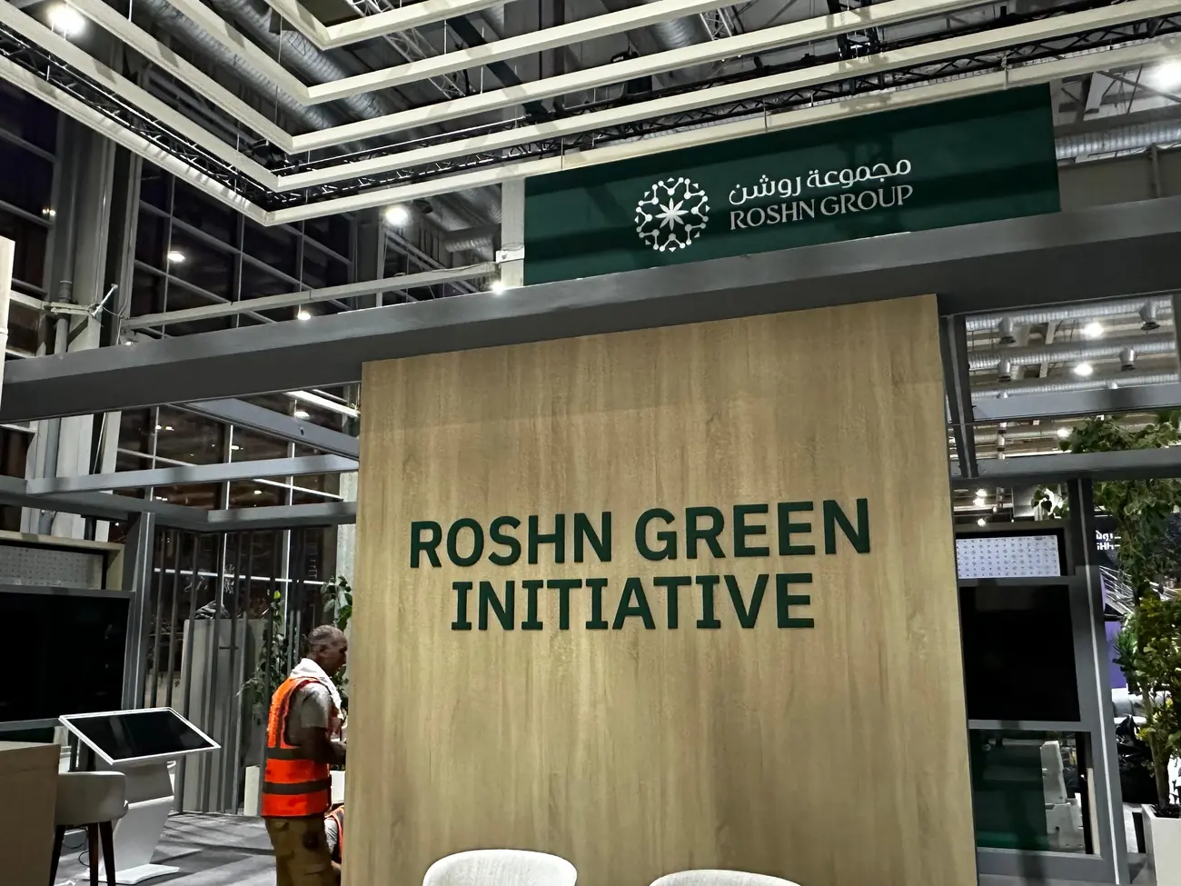 ROSHN Green Initiative stand with interactive screens
