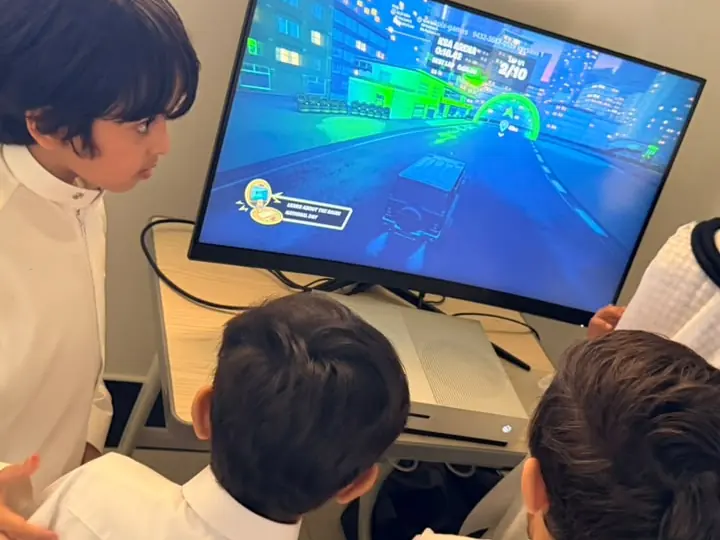 Students playing our Saudi National Day Fortnite map in class